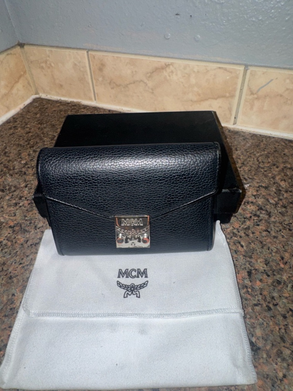 MCM Black Pebbled Leather compact wallet full inclusion